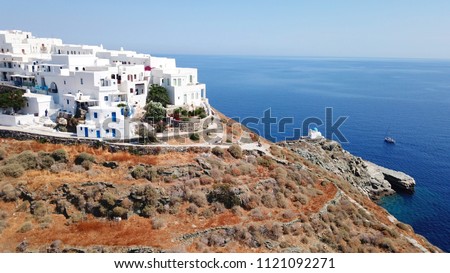 Aerial drone bird's view photo of iconic and picturesque village of Kastro featuring small chapel of Eptamartyres overlooking the Aegean sea, Sifnos island, Cyclades, Greece