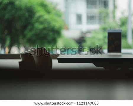 dining table and chair ,with green bokeh background