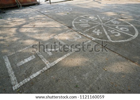 The Hopscotch draw on the ground.