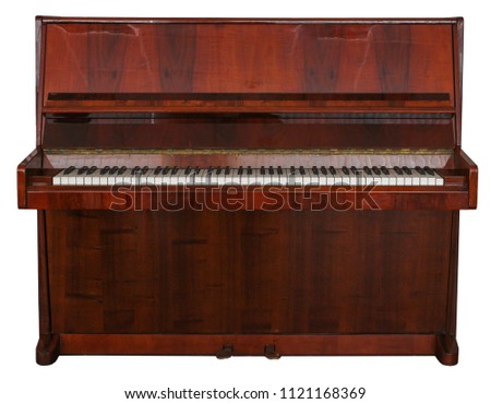 Wooden piano on white isolated background.
