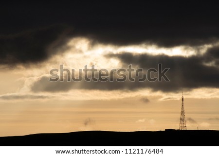 Light rays with clouds at sunset