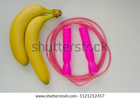 Healthy set with jumping rope and banana. Healthy lifestyle