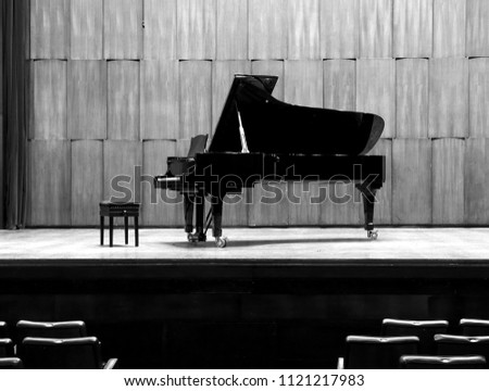 Black grand piano on stage before the concert,b&w