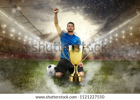 Golden winner's cup in the middle of a stadium with audience