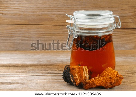 Healing tea from birch mushroom chaga is used in folk medicine.