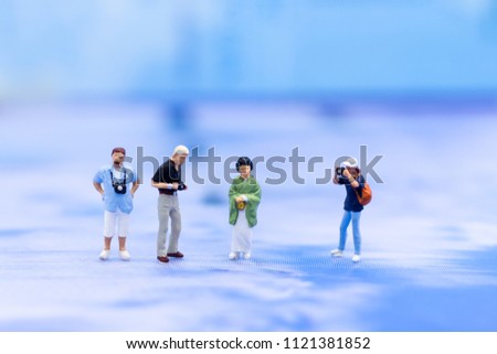 Miniature people: Moderator are interviewing woman wearing a kimono. Image use for Entertainment Industry.