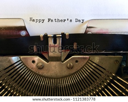 Happy Father’s Day, greeting typed in old fashioned type font on vintage manual typewriter machine