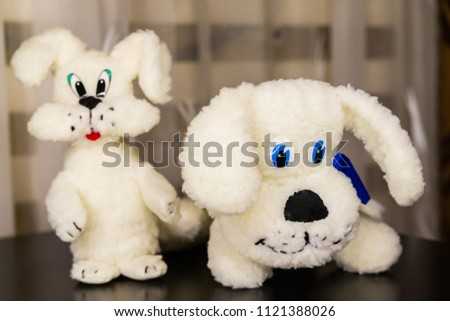 Two cute white puppies soft toy