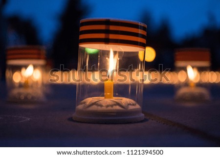 Photo of burning candles during the international action Candle of Memory dedicated to the beginning of the Great Patriotic War