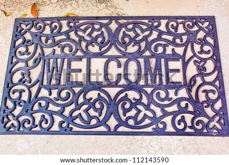 a welcome mat at home Royalty-Free Stock Photo #112143590