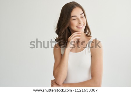  woman smiling looking place free on light background                              