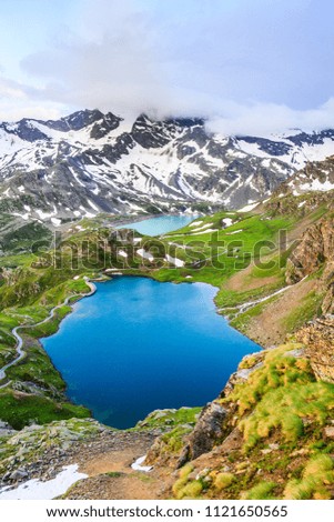 Panoramic view of Lake Agnel from Gran Paradiso national Park. Italy. Landscape from Italian Alps mountains in the summer.Aerial photography of beautiful mountains.