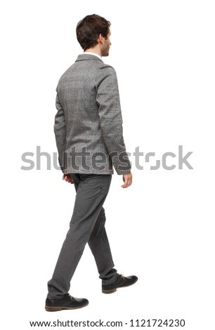 back view of walking business man.  going young guy in gray suit. Rear view people collection.  backside view of person.  Isolated over white background. Young businessman goes into the distance