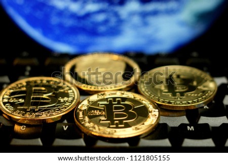 Bitcoin souvenir coins. Conceptual image for worldwide cryptocurrency and digital payment system