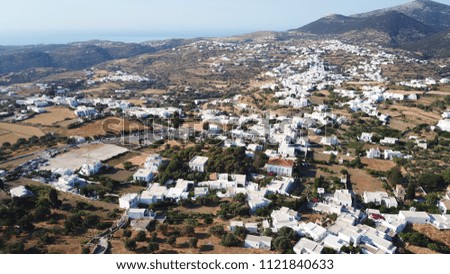 Aerial drone bird's eye view photo of picturesque and traditional whitewashed chora of Sifnos island, Cyclades, Greece