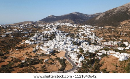 Aerial drone bird's eye view photo of picturesque and traditional whitewashed chora of Sifnos island, Cyclades, Greece