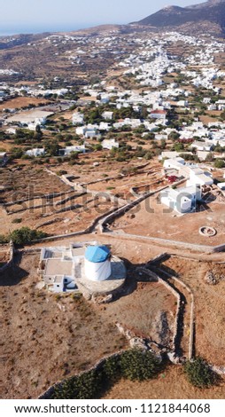 Aerial drone bird's eye view photo of picturesque and traditional whitewashed village of Artemonas, Sifnos island, Cyclades, Greece