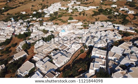 Aerial drone bird's eye view photo of picturesque and traditional whitewashed village of Artemonas, Sifnos island, Cyclades, Greece