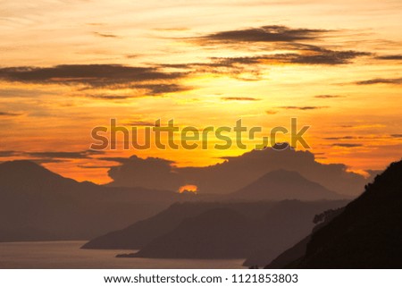 A view of the sunset seen in Lake Toba, north sumatra, indonesia.