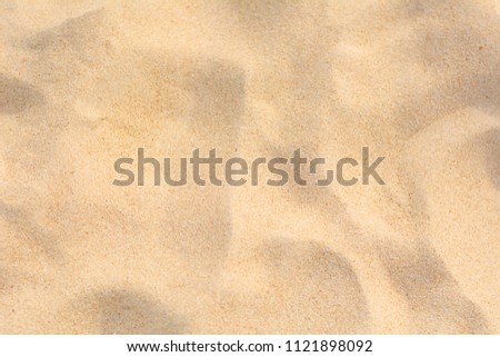 Close-up Sand Beach In Summer Sun