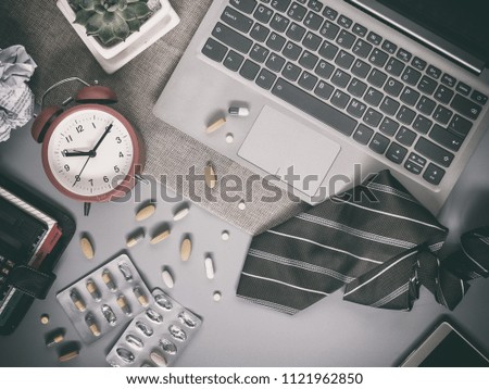Concept of stressful and pressure working because of deadline and cause bad health and using medicines. Dead line business concept. Working and healthy concept.