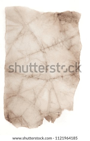 Blank aged paper sheet as old dirty frame background with dust and stains. Front view. Vintage and antique art concept. Detailed closeup studio shot. Toned