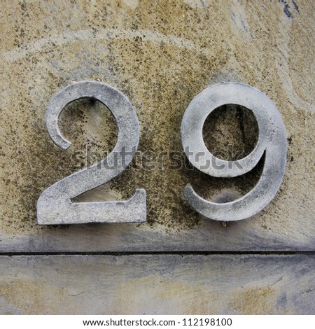 House number twenty-nine, two separate cut-out metal numbers