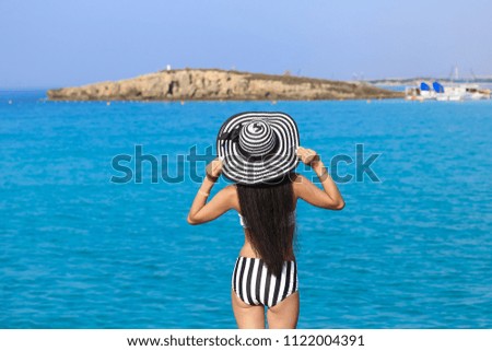 Woman back on the beach