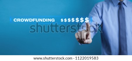 Businessman pressing dollar signs. Crowdfunding concept
