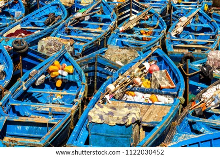 Blue wooden fishing boats

