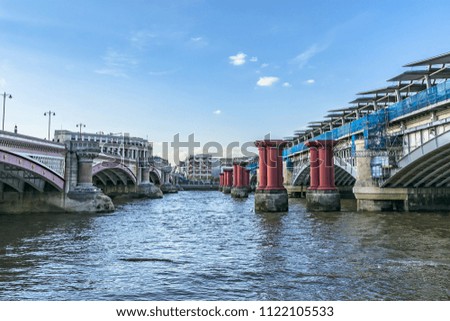 Bridges and Embankment of the River Thames at sunset. London, UK.