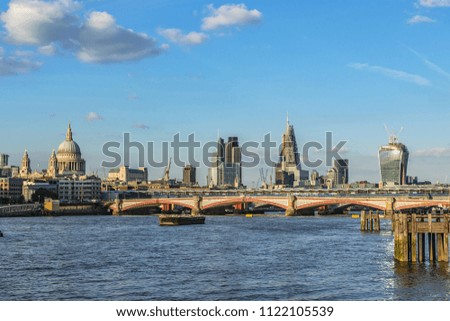 Bridges and Embankment of the River Thames at sunset. London, UK.