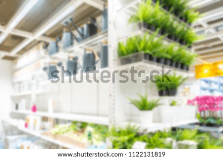 Abstract blurred and defocused shopping mall in department home store interior for background usage
