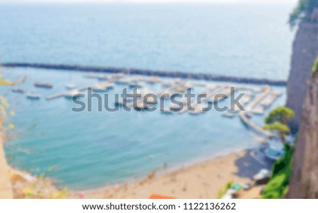 Defocused background with aerial view of a Touristic Harbour in Sorrento, Italy. Intentionally blurred post production for bokeh effect