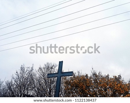 cross in blue sky