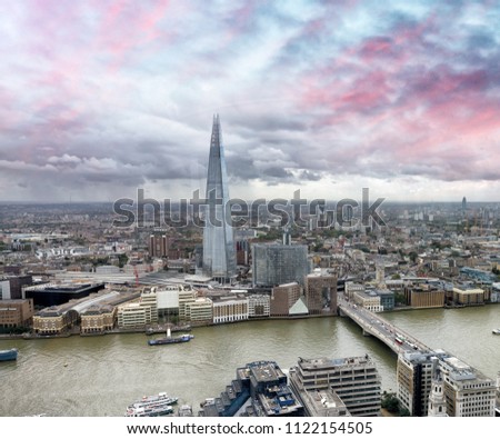London skyline along river Thames, aerial view.
