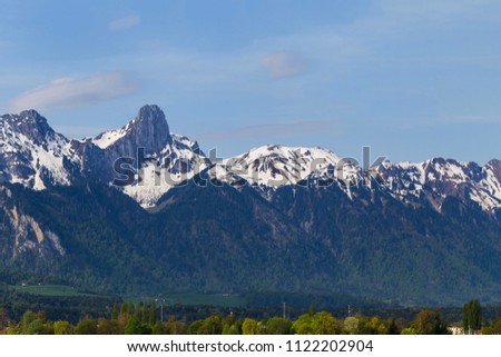 Stockhorn of Bernese Alps with lake Thun looking from street in village, Berne, Switzerland ( panorama )