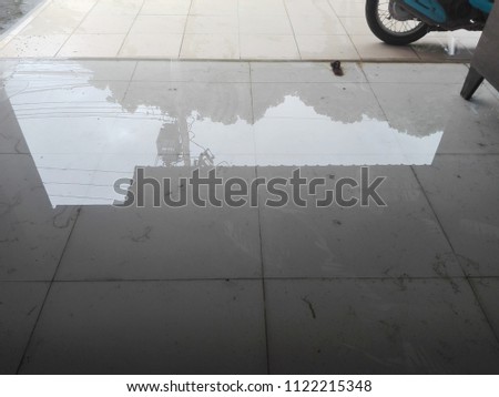 Blurry image,The reflection on the surface after rain. Change of weather That affects the daily life,need blur picture