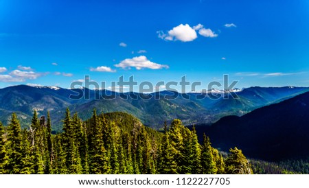 Rugged Peaks of the Cascade Mountain Range on the US-Canada border as seen from the Cascade Lookout viewpoint in EC Manning Provincial Park in British Columbia, Canada Royalty-Free Stock Photo #1122227705
