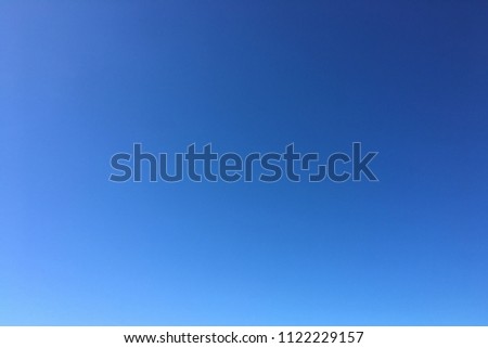Beautiful blue sky with clouds background.Sky clouds.Sky with clouds weather nature cloud blue.Blue sky with clouds and sun Royalty-Free Stock Photo #1122229157