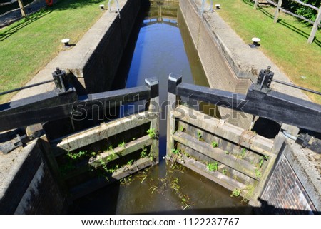 A Canal Lock on the Wey and Arun  canal in England in summertime
