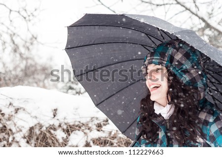 Picture of a woman with a lot of snowflakes