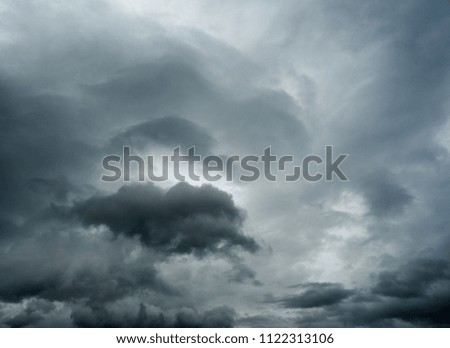 Dark layer clouds sky cover sun before raining. Abstract nature background. Black and white tone.