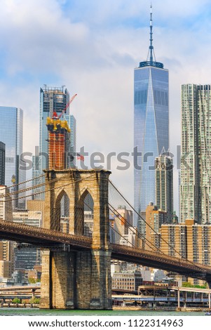 Suspension Brooklyn Bridge across the East River between the Lower Manhattan and Brooklyn. New York, USA.