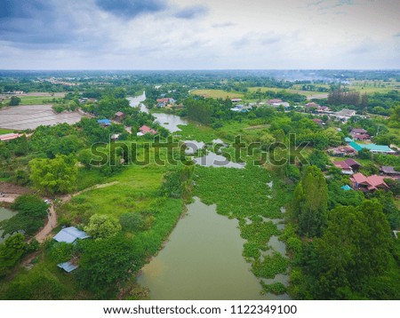 Aerial view of river and tree forest, Thailand