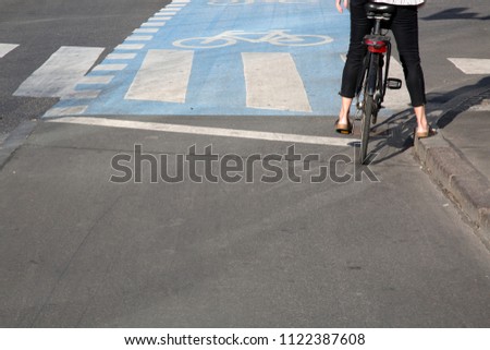 Demale Cyclist on Bike Lane; Copenhagen; Denmark