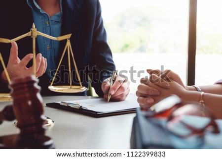 Law should know concept, The lawyer explained to the client to plan the case in court. Royalty-Free Stock Photo #1122399833