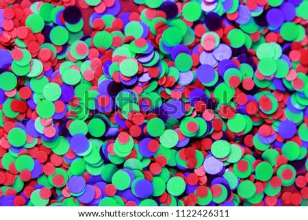 festive textured background of colorful party confetti