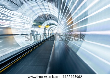 Train motion blur in Shanghai tunnel in China Royalty-Free Stock Photo #1122495062