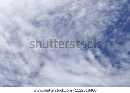 Blue sky clouds in the background image.